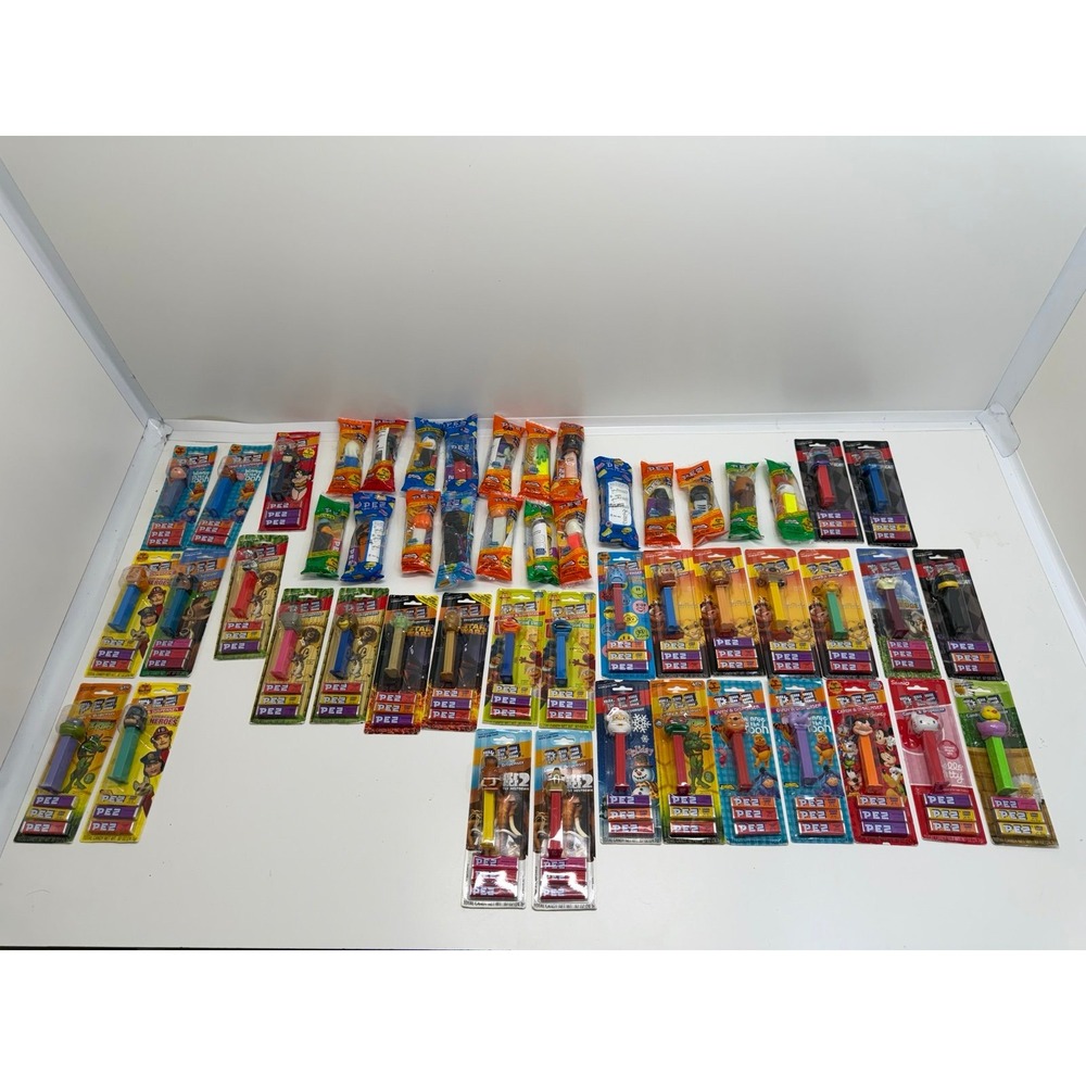 Lot of PEZ candy dispensers. 51 Total. Still in packaging New. Never Used